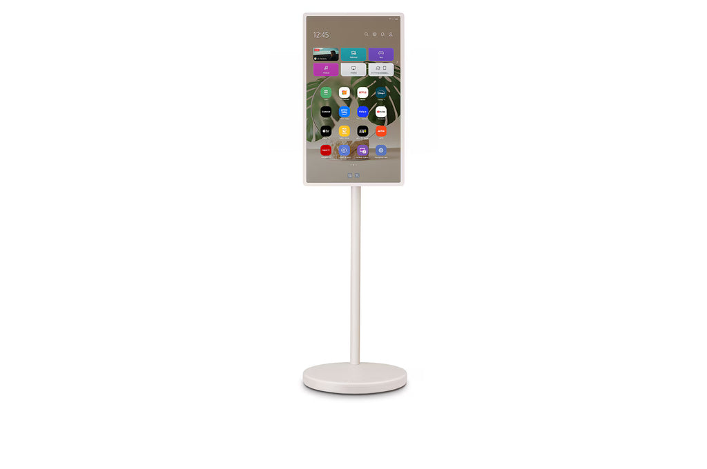 Écran TV sans fil LG StanbyME 27" avec support sur pied et batterie intégrée, affichant une image claire et moderne.