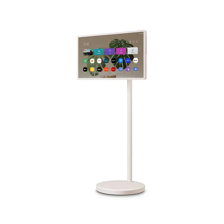 Écran TV LG StanbyME 27" sans fil avec pied et batterie intégrée, affichant une image claire et moderne.