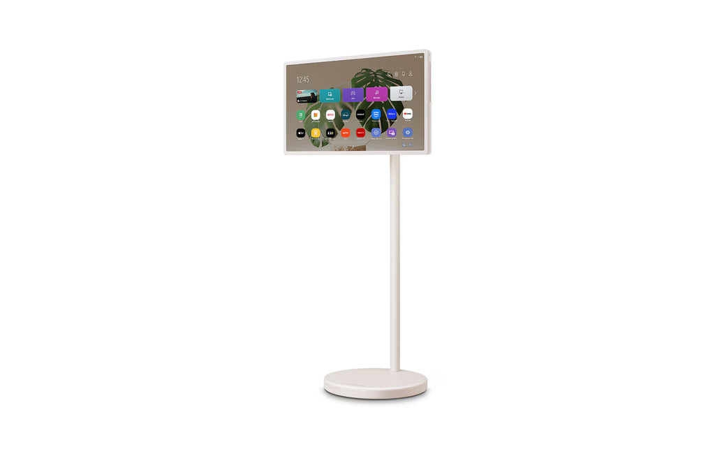 Écran TV sans fil LG StanbyME 27" avec support sur pied et batterie intégrée, affichant une image haute définition.
