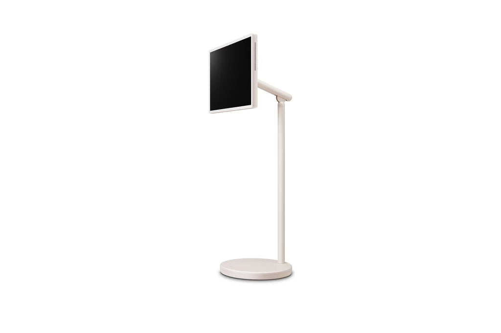 Téléviseur LG StandbyME 27 pouces, écran sans fil sur pied avec batterie intégrée, visible en position sur un support.